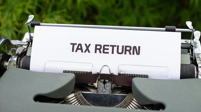 How do U.S. retirees file their first French tax return after moving to France?